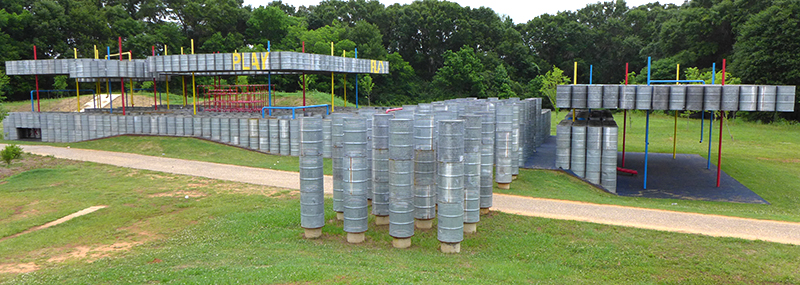 Rural Studio designed barrel playground