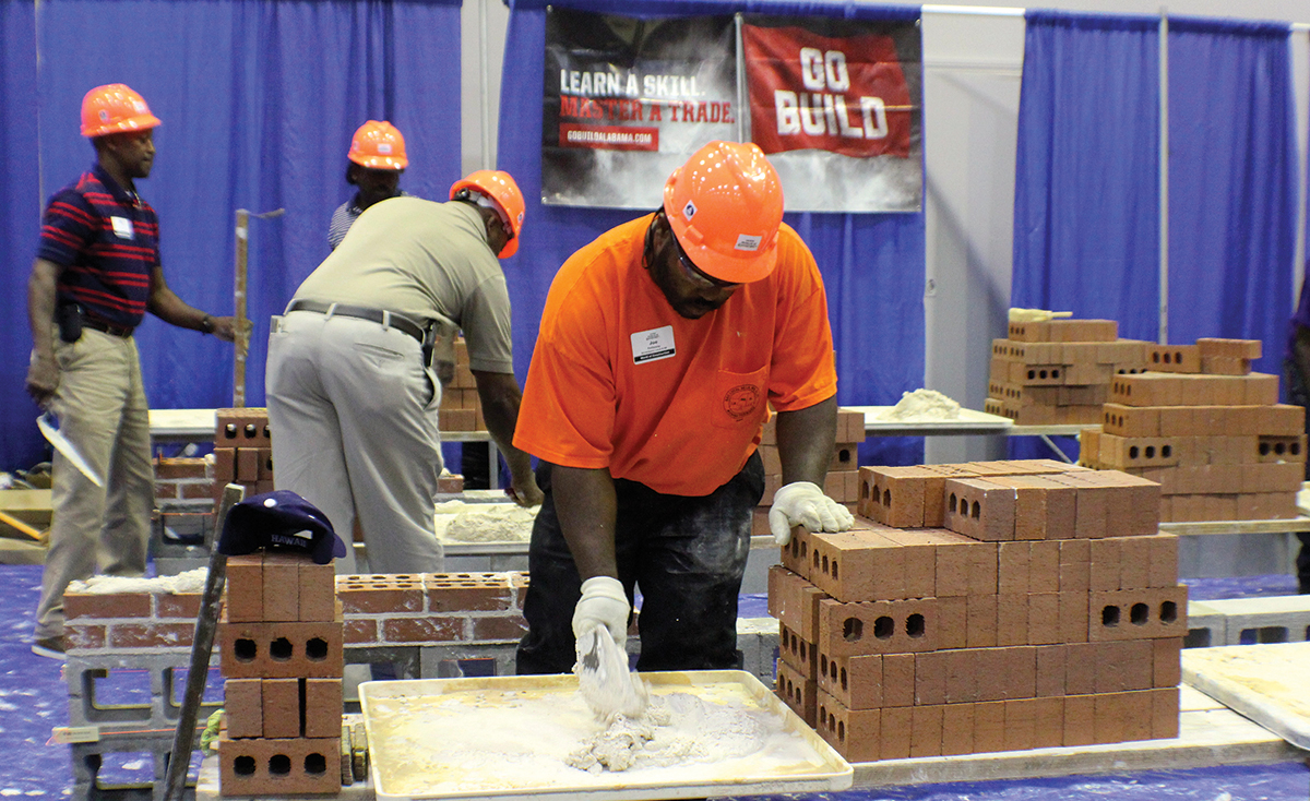 Students try their hands at brick masonry at the Southwest Alabama Workforce Development Council’s Worlds of Opportunity fair, a large career expo in held Mobile. Photos courtesy Big Communications