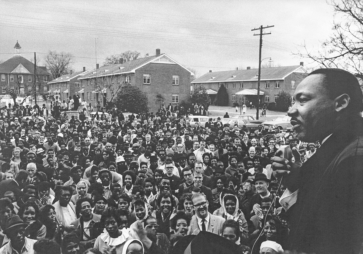 The Rev. Martin Luther King Jr. speaks to a large crowd in Selma in March 1965 as they prepare to begin a march to Montgomery. 