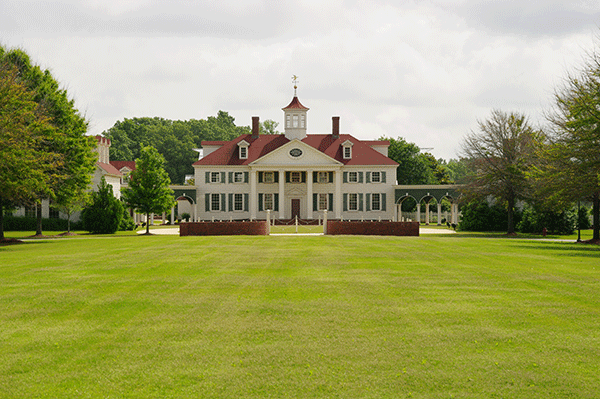 A lawn view of Washington Hall at the American Village.