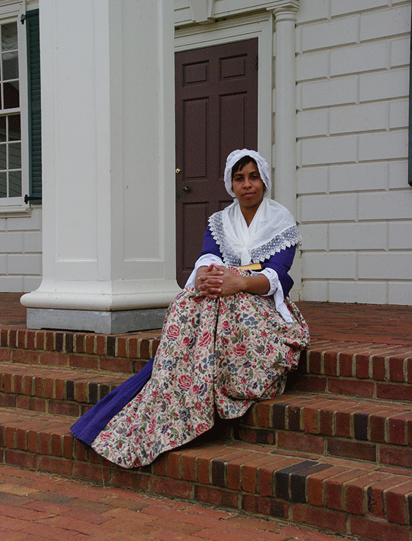 Leslie Johnson portrays Phillis Wheatley, a former slave who became a renowned poet.