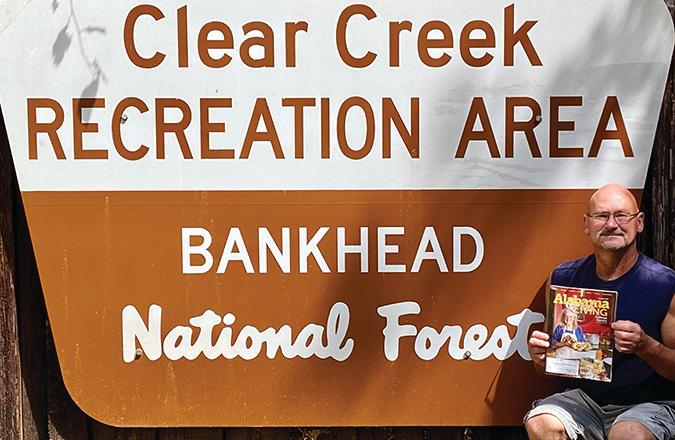 With so many beautiful places right here in Alabama to enjoy, Brad and Sandra Peppers of Cullman say they often come to relax in the Bankhead National Forest and to catch up on reading Alabama Living! They are members of Cullman Electric Cooperative.