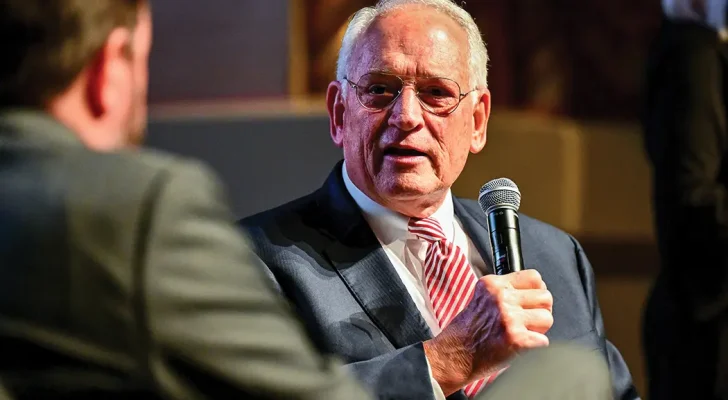 Troy University Chancellor Dr. Jack Hawkins Jr. is interviewed by journalist Todd Stacy at the premiere of the new short film, “Beyond a War.” 
Photo courtesy Troy University